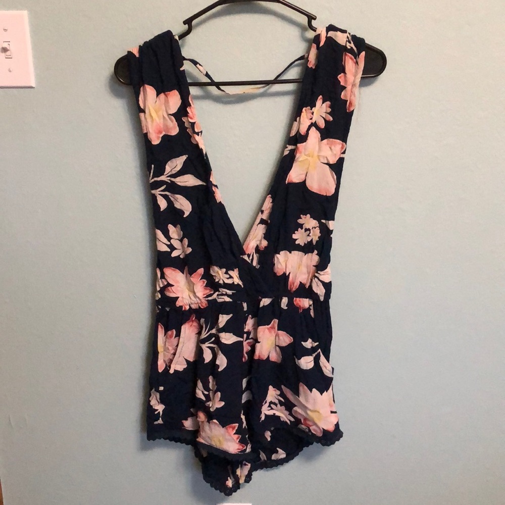 Deep v open back navy blue floral romper